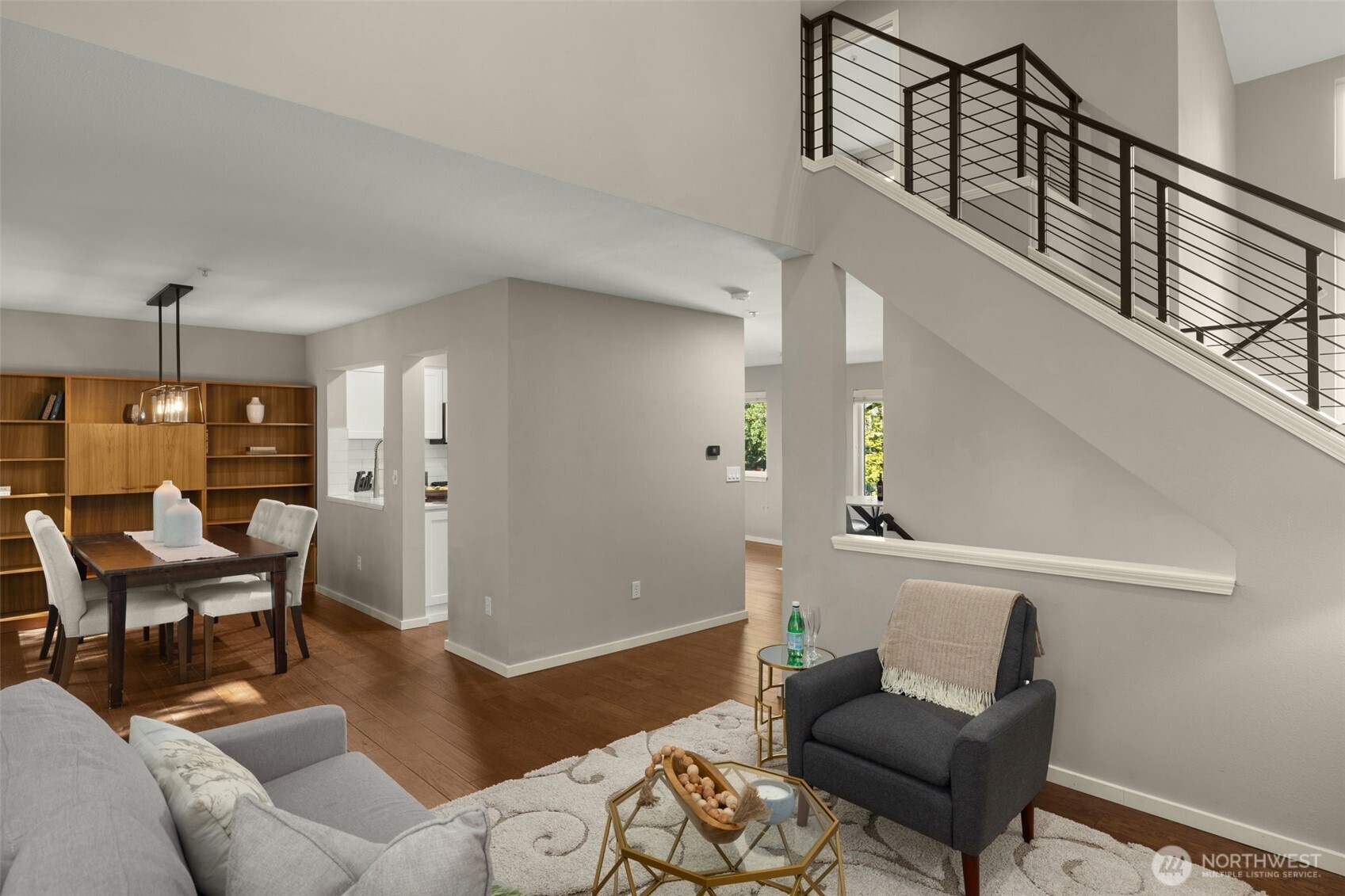 wrought iron railing, rich hardwoods