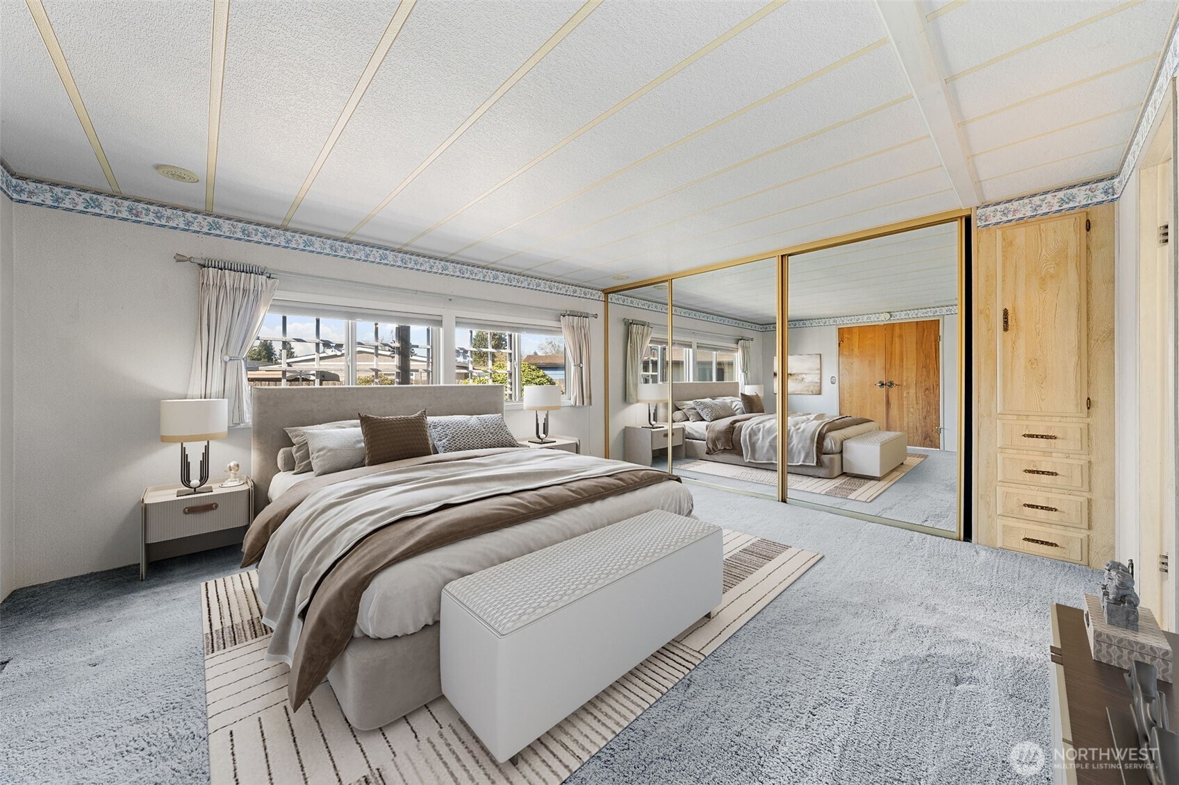 Digitally staged primary bedroom.