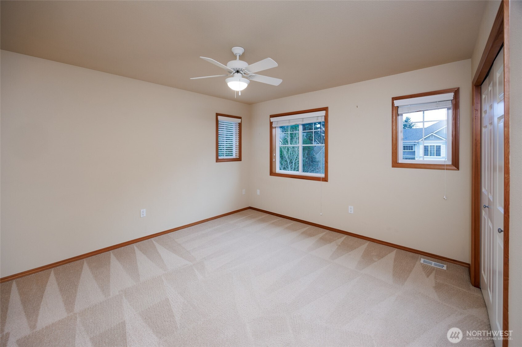 Upper full bathroom w/tiled countertops/backsplash, dual vanities & skylight.