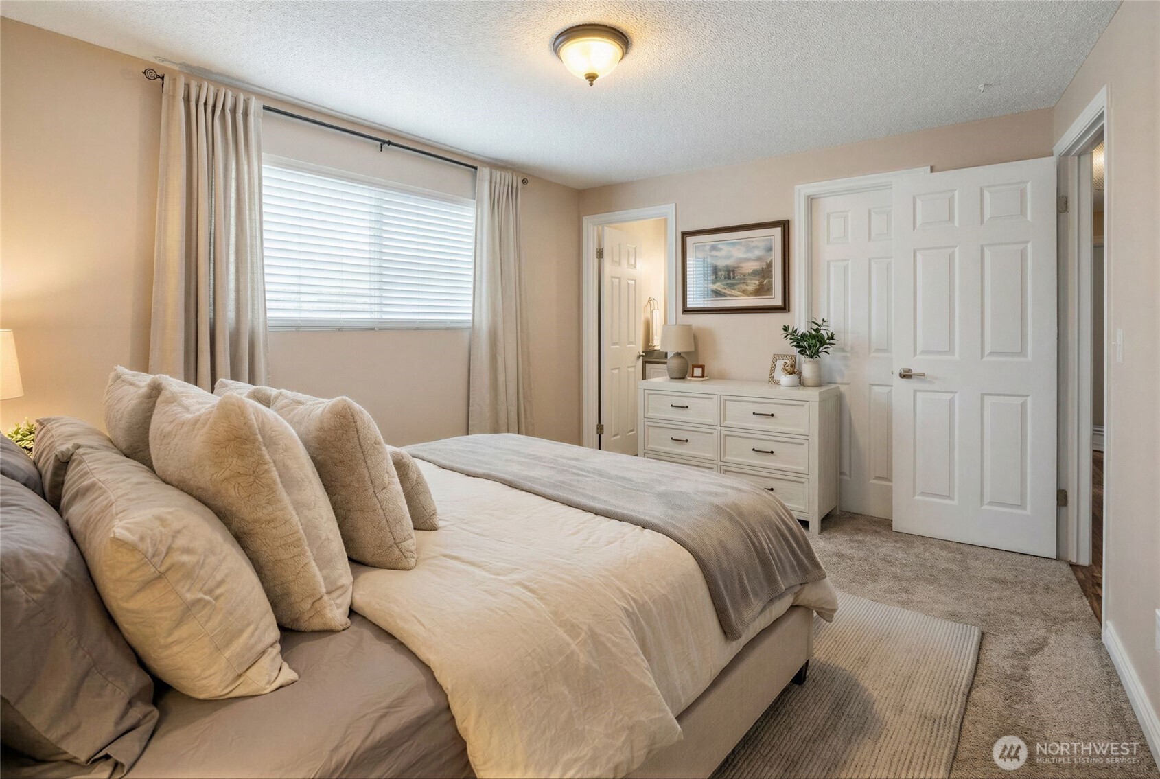 Virtually staged primary bedroom view 2