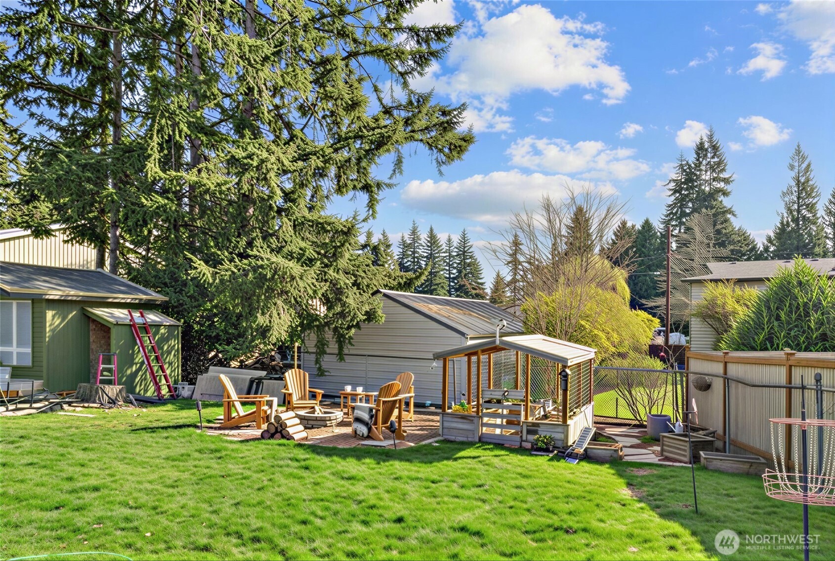 Backyard with garden space and fire pit