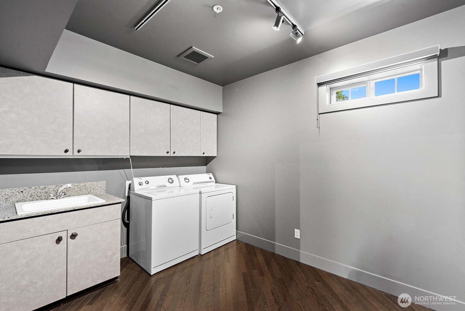 The biggest condo laundry room ever. Seller used it as a second office too.