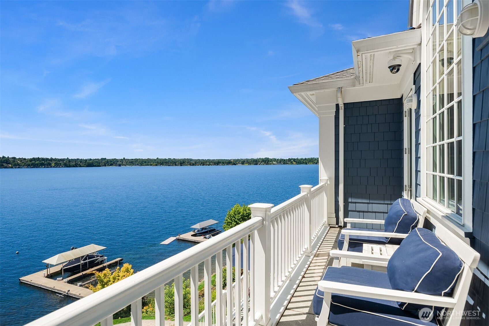 A morning espresso or a place to unwind at end the day with this comfortable deck off the primary suite.