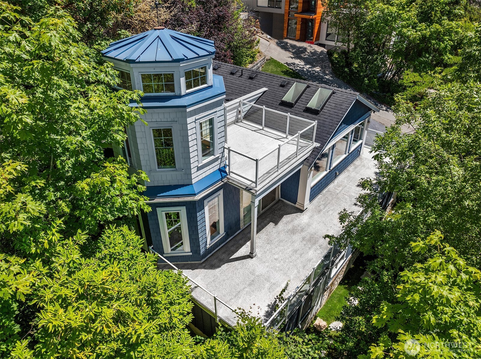 DADU has full bedroom, bathroom, living room, and staircase to upstairs deck and viewing room.