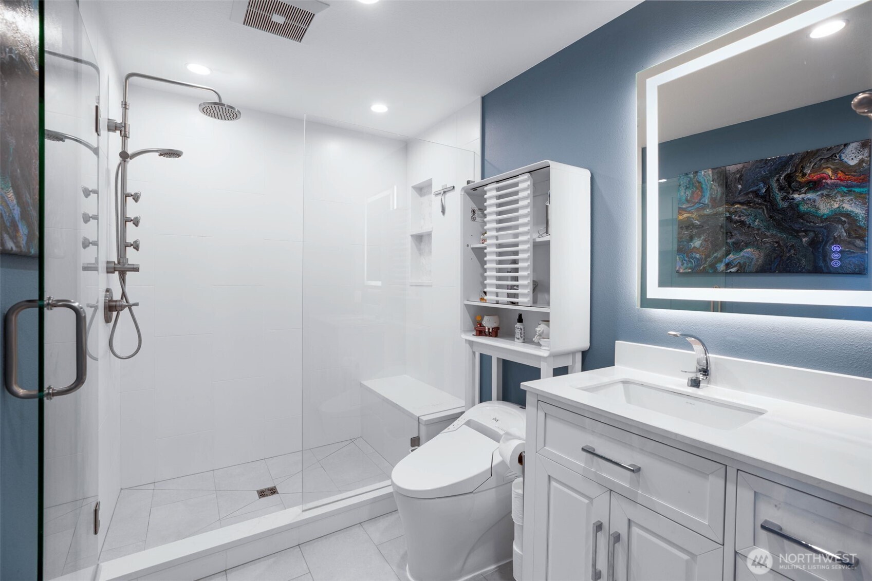 Primary en suite bathroom with heated floors.