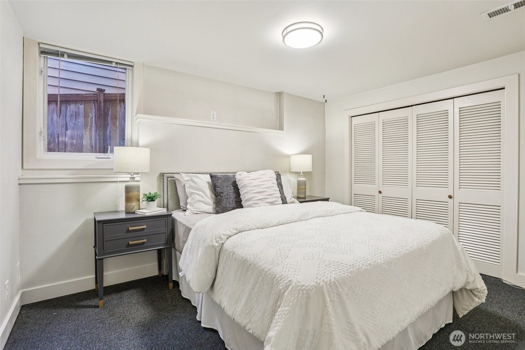 Downstairs, a third bedroom and bathroom are also a part of the main living area, separate from the ADU.