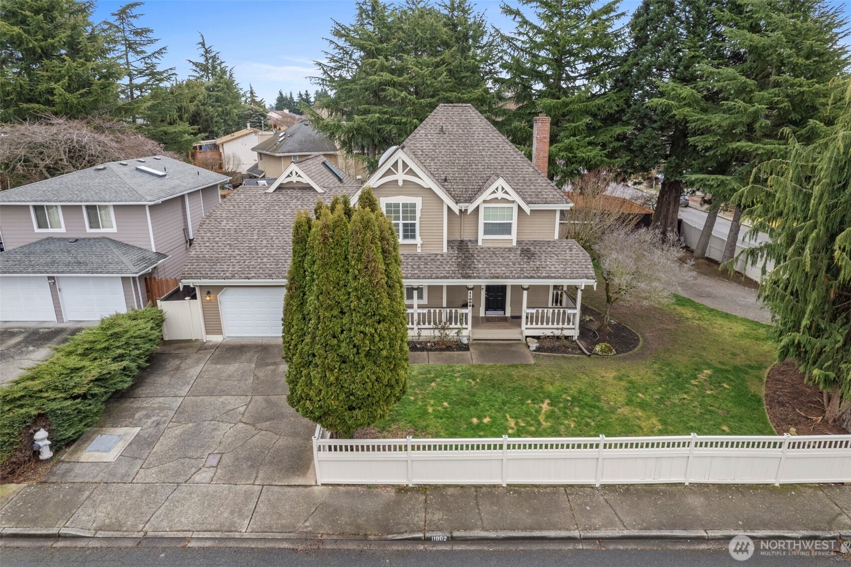 Plenty of driveway space and gated access create easy parking for vehicles, RV, or boat storage.