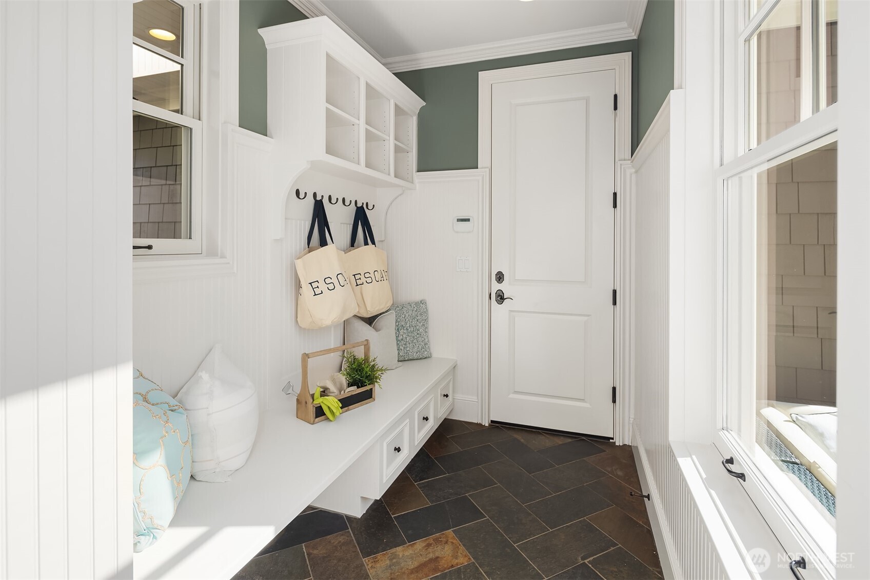 Mudroom off garage and kitchen.
