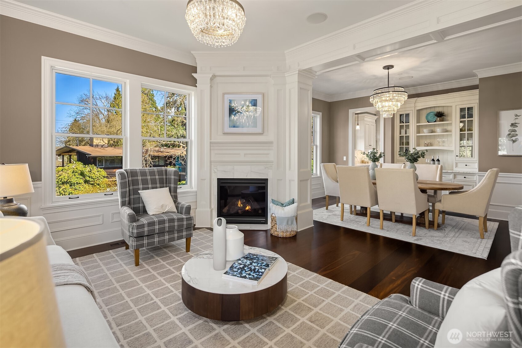 Adjacent dining room with exquisite millwork.