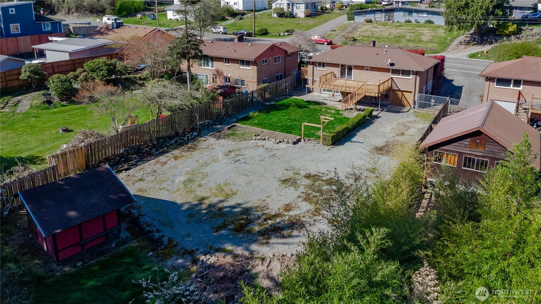 Side view of the lot. Flat and ready for your additional vehicles, or toys, or RV, or boat, or ?
