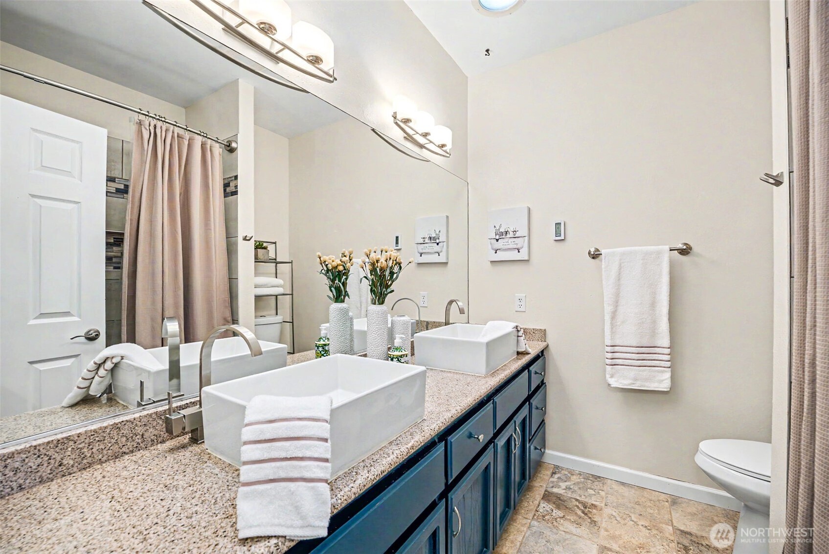 Main bathroom with vessels sinks.