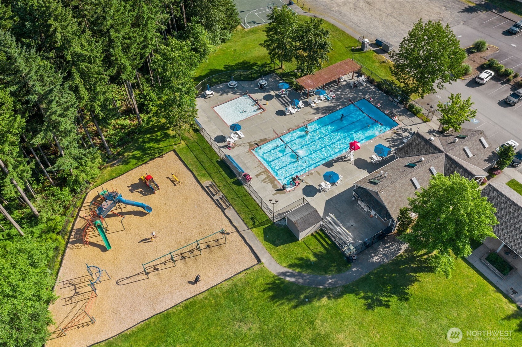 Picture of 1 of 2 pools, a park, & basketball courts that Klahanie residents have access to