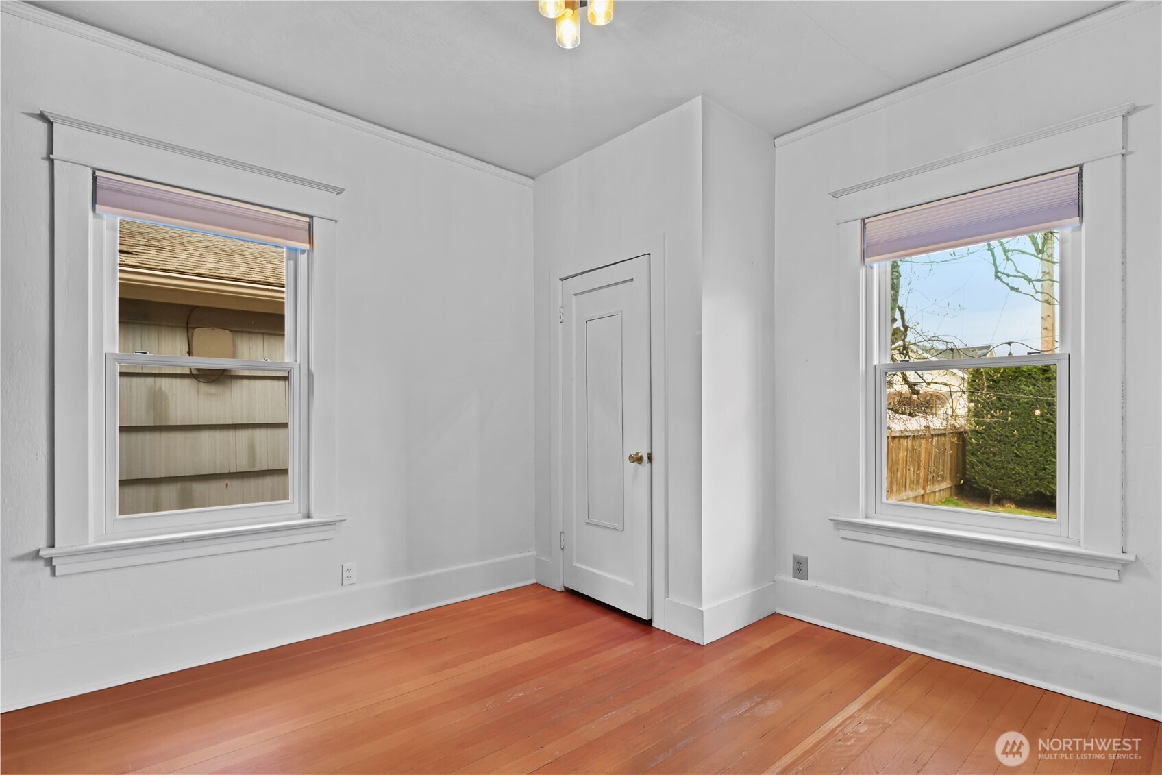 Bedroom 3 looks out to the back yard