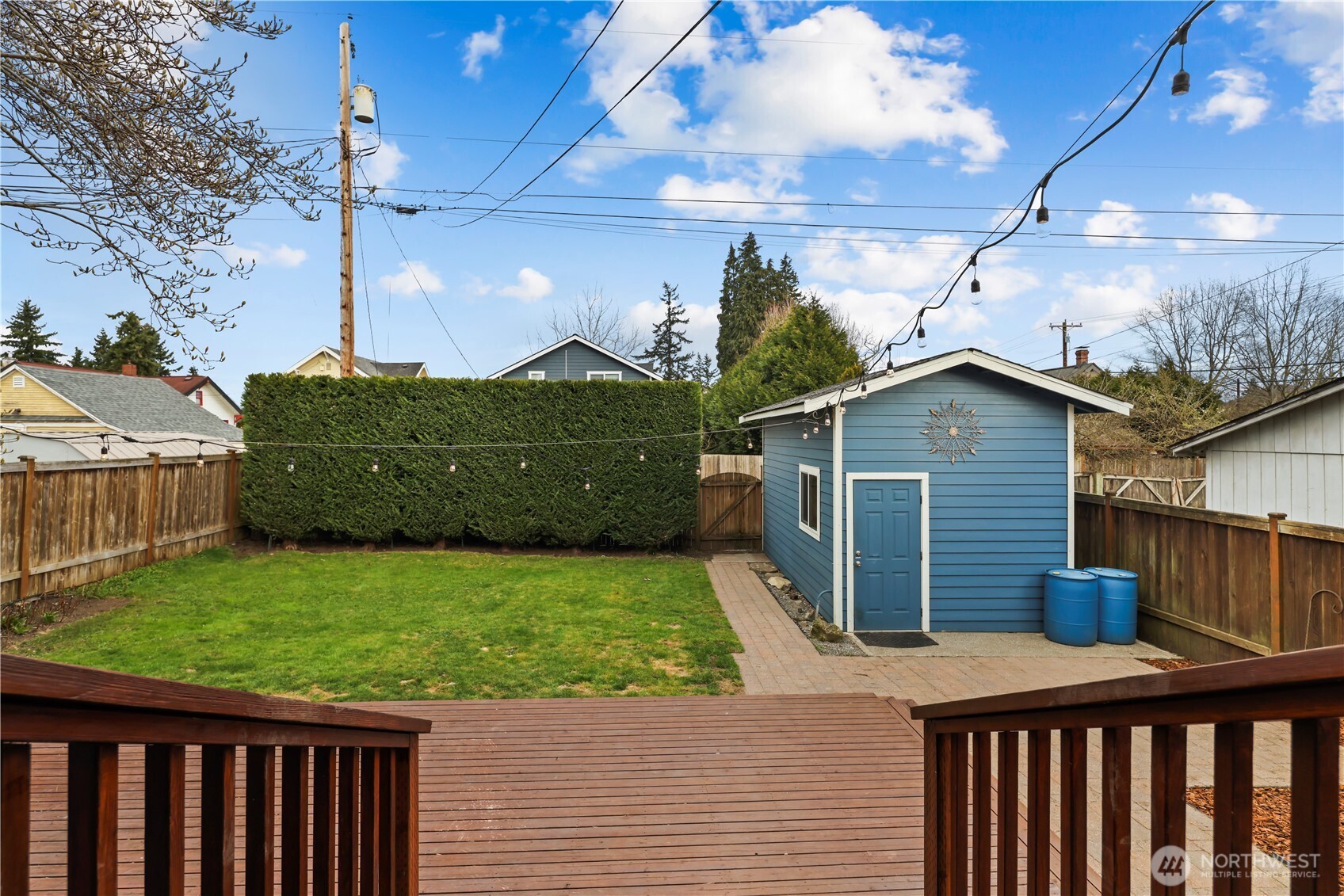 Off the kitchen, a huge deck to the private backyard