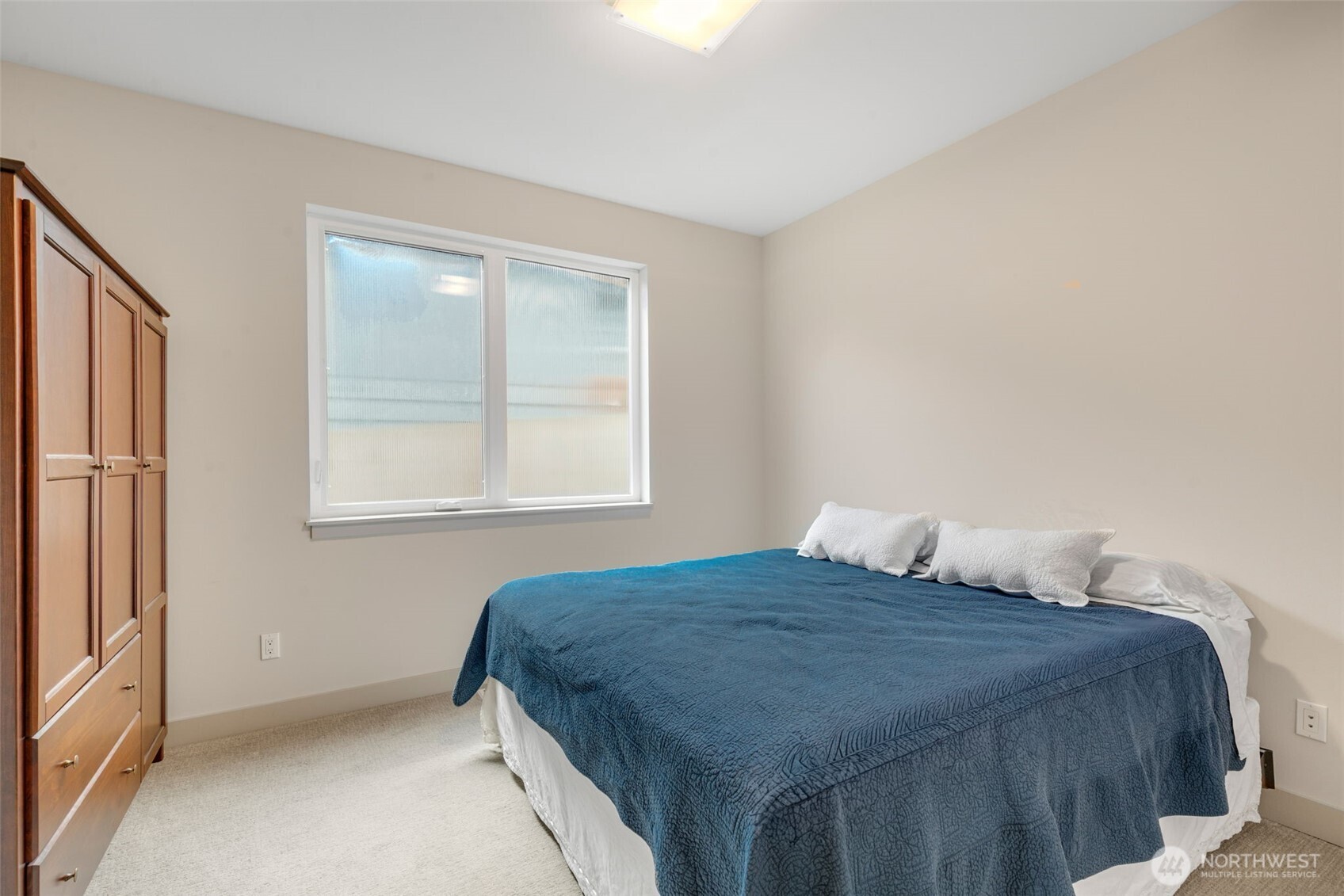 One of 4 private and spacious bedrooms on the main floor.