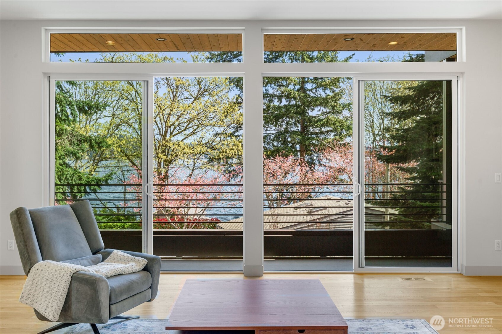 The serene lake view from the upper floor living room.
