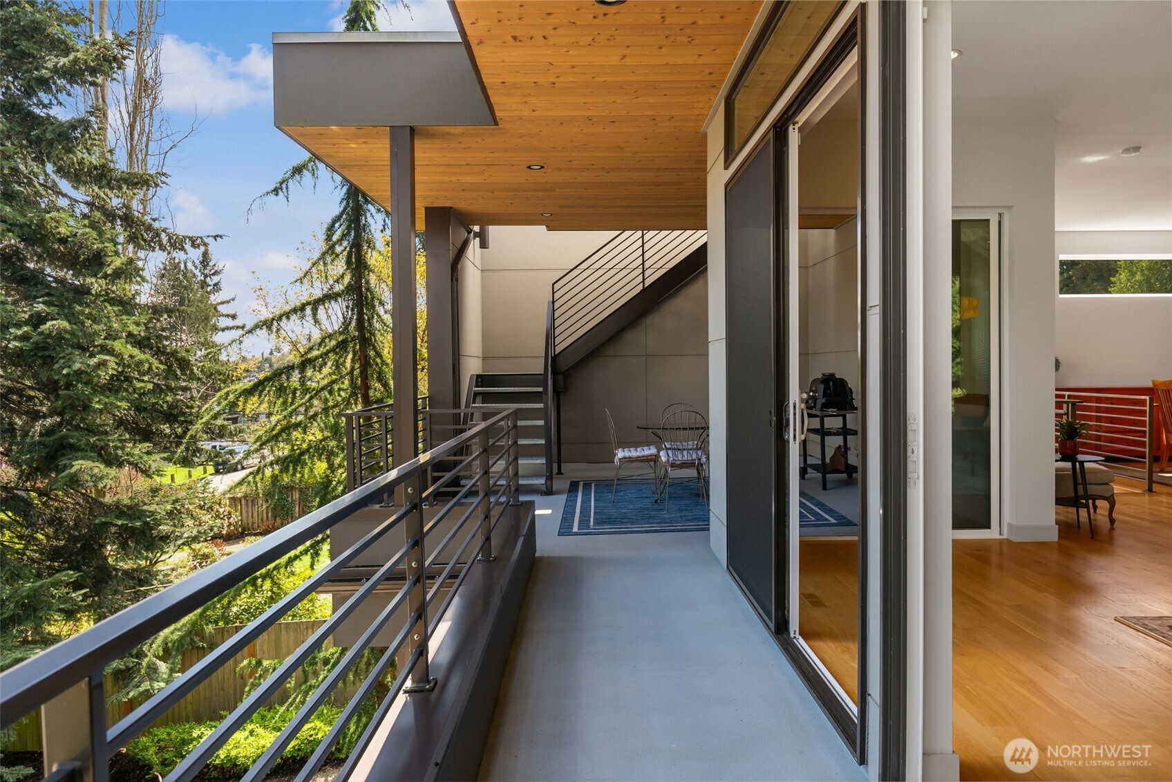 Surrounded by evergreens with views of the lake and Mt Ranier, the outdoors is seamlessly integrated into your living spaces.