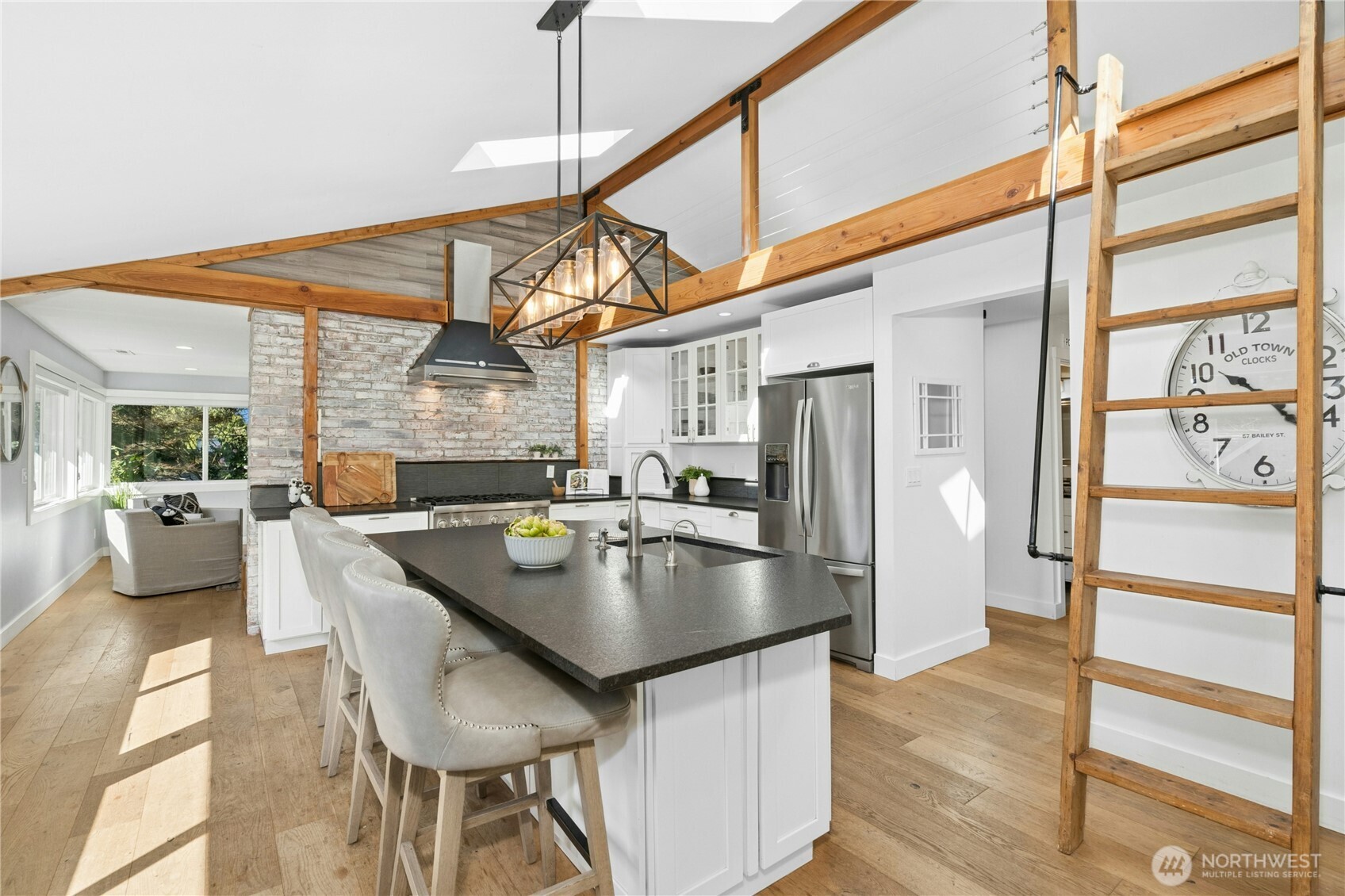 Vaulted celings and wall of windows with beautiful southern exposure