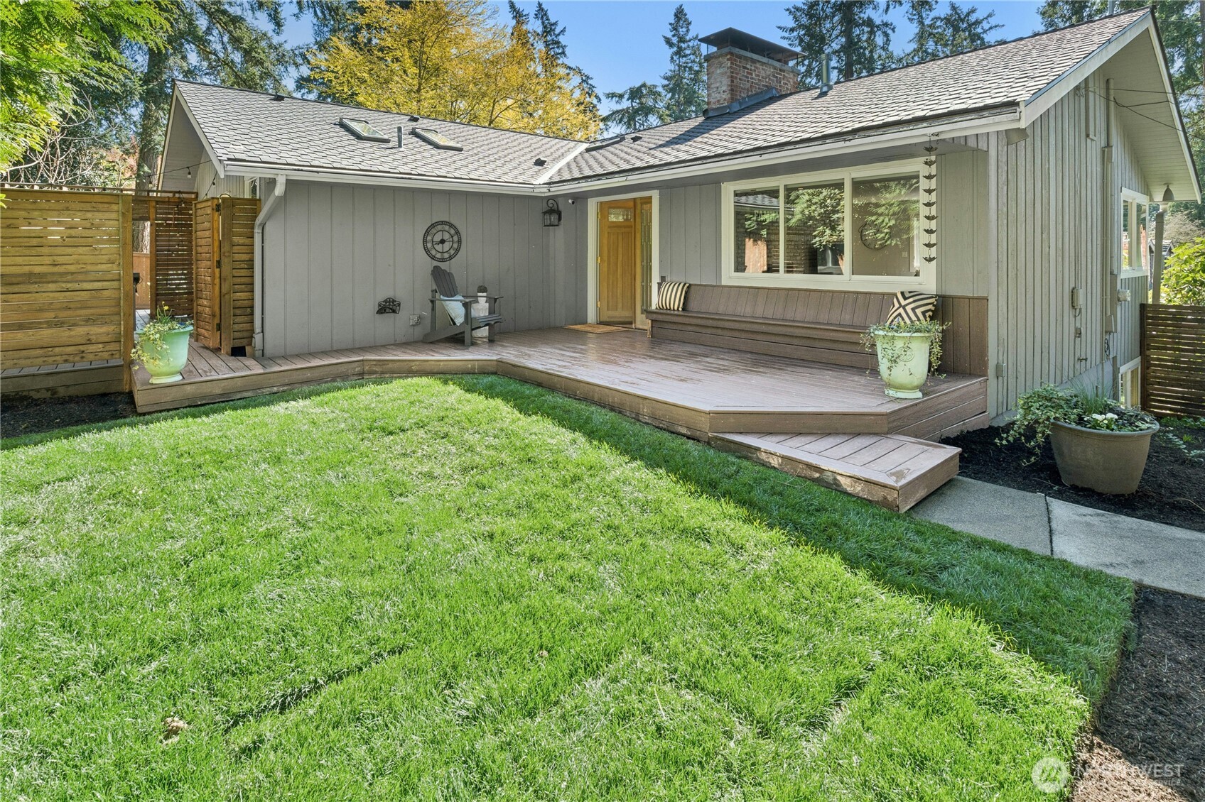 Flat yard with Trex deck and new sod