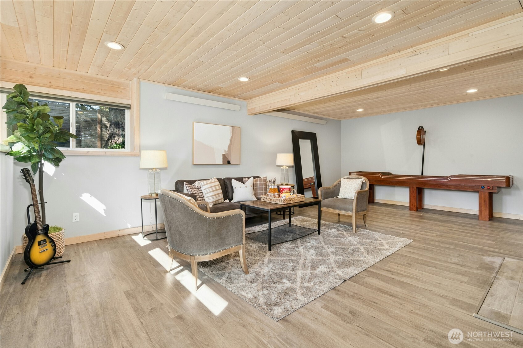 Lower level/ADU large living room with fireplace and loads of space.