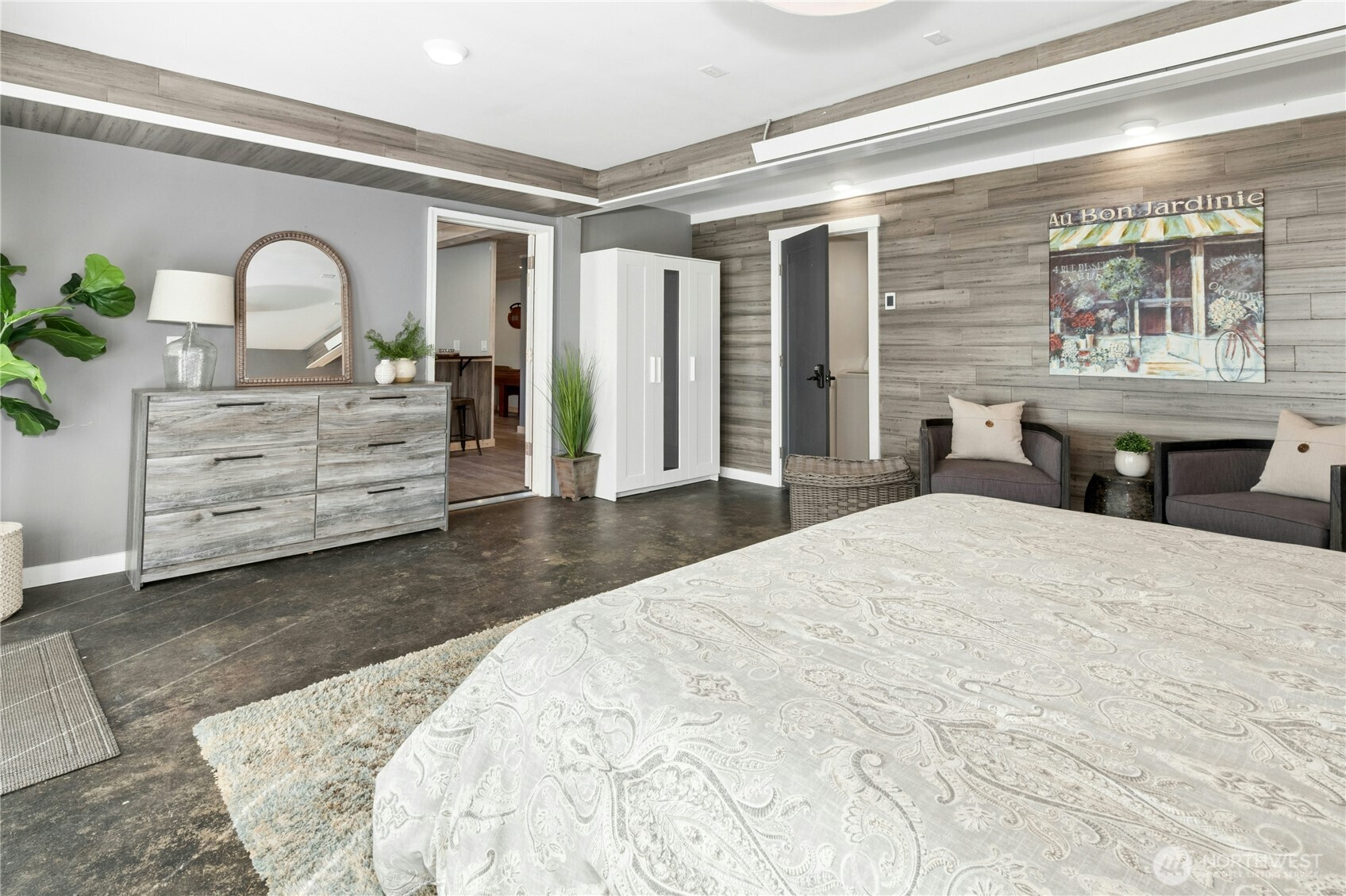 Lower level expansive bedroom with french doors