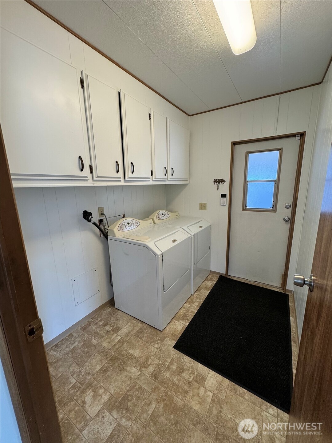 Utility Room with Access to Carport.