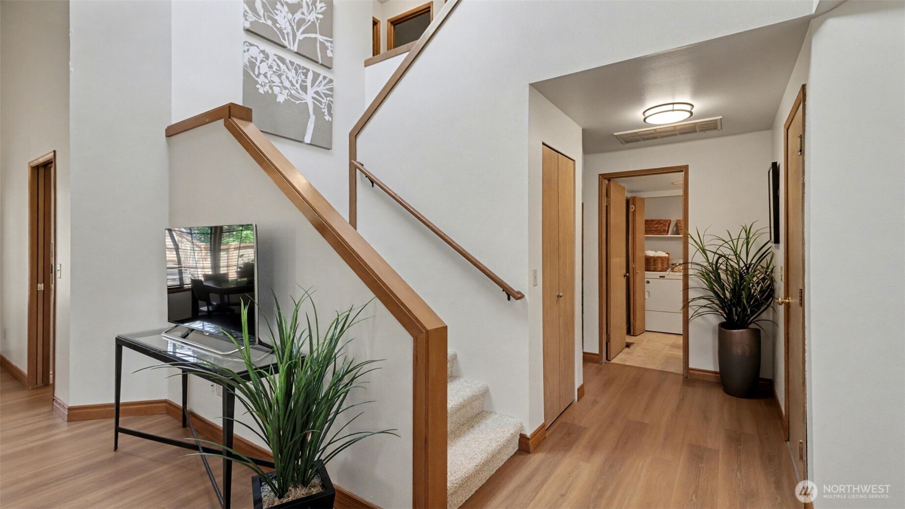 This is the entry to the home with the vault living room and stairwell.
