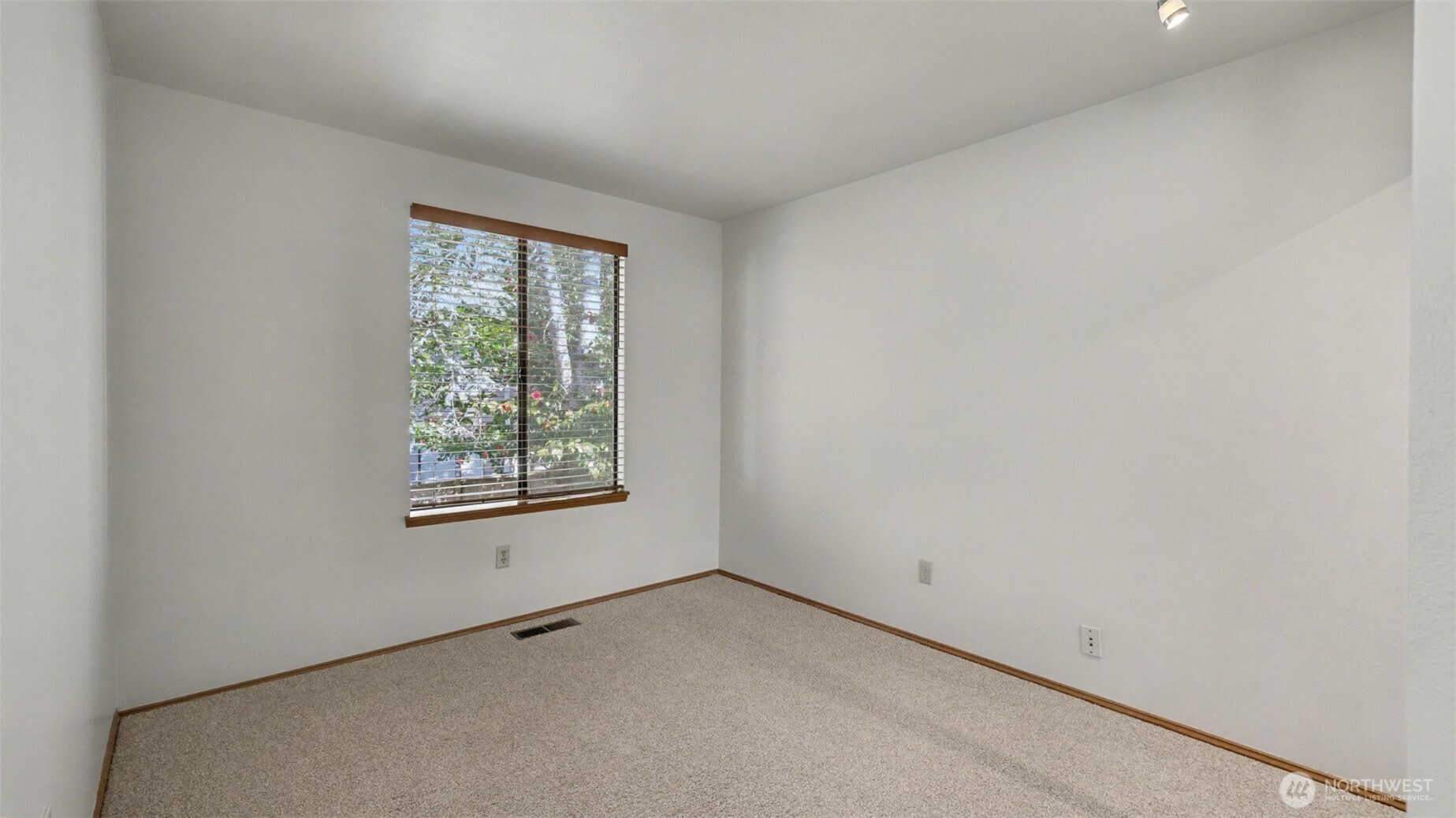 The second of the total 3 bedrooms. The entire home has brand new carpet throughout.