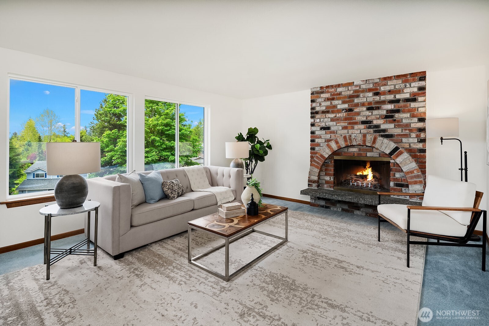 Cozy wood fireplace in living room.