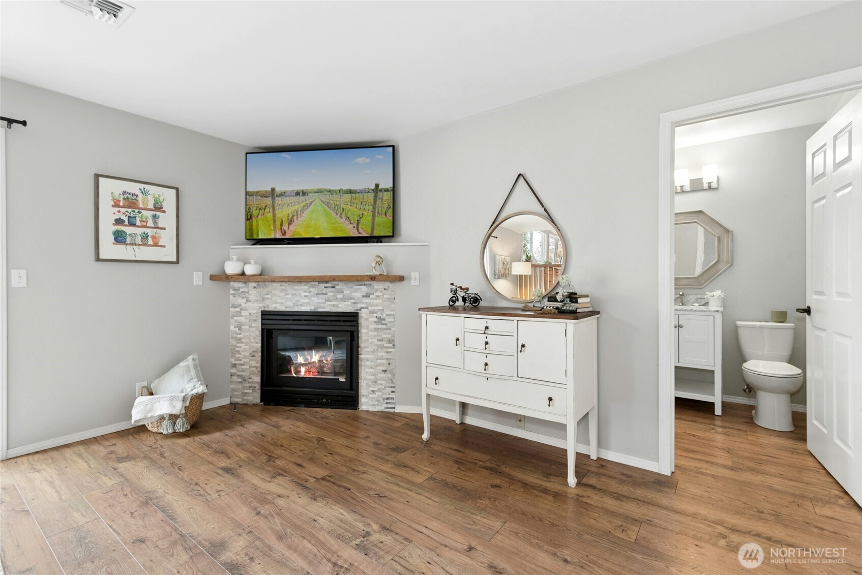 Family room with gas fireplace and powder room