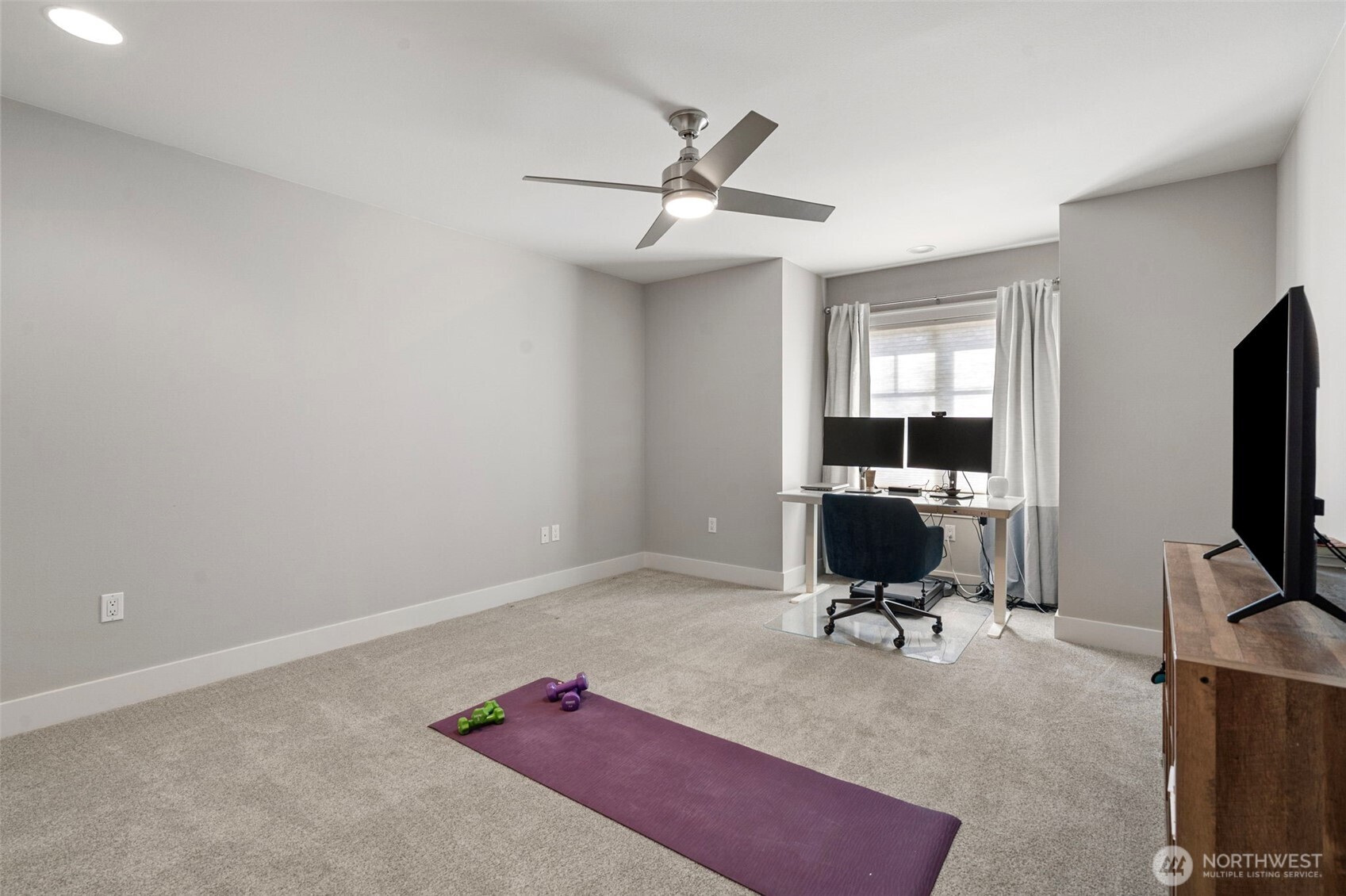 4th bedroom on upper level - all bedrooms enjoy oversized closets and plenty of natural light.