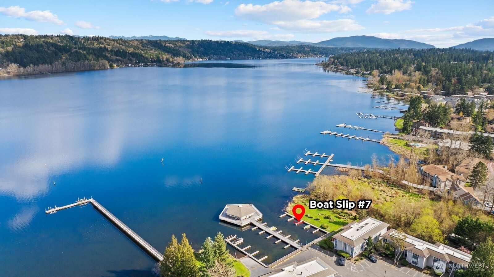 Live on Lake Sammamish with your own deeded boat slip (#7).