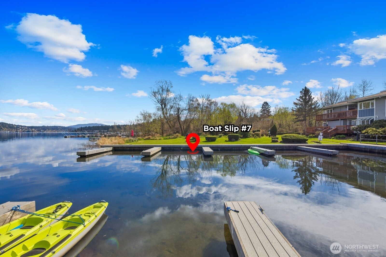 Live on Lake Sammamish with your own deeded boat slip (#7).