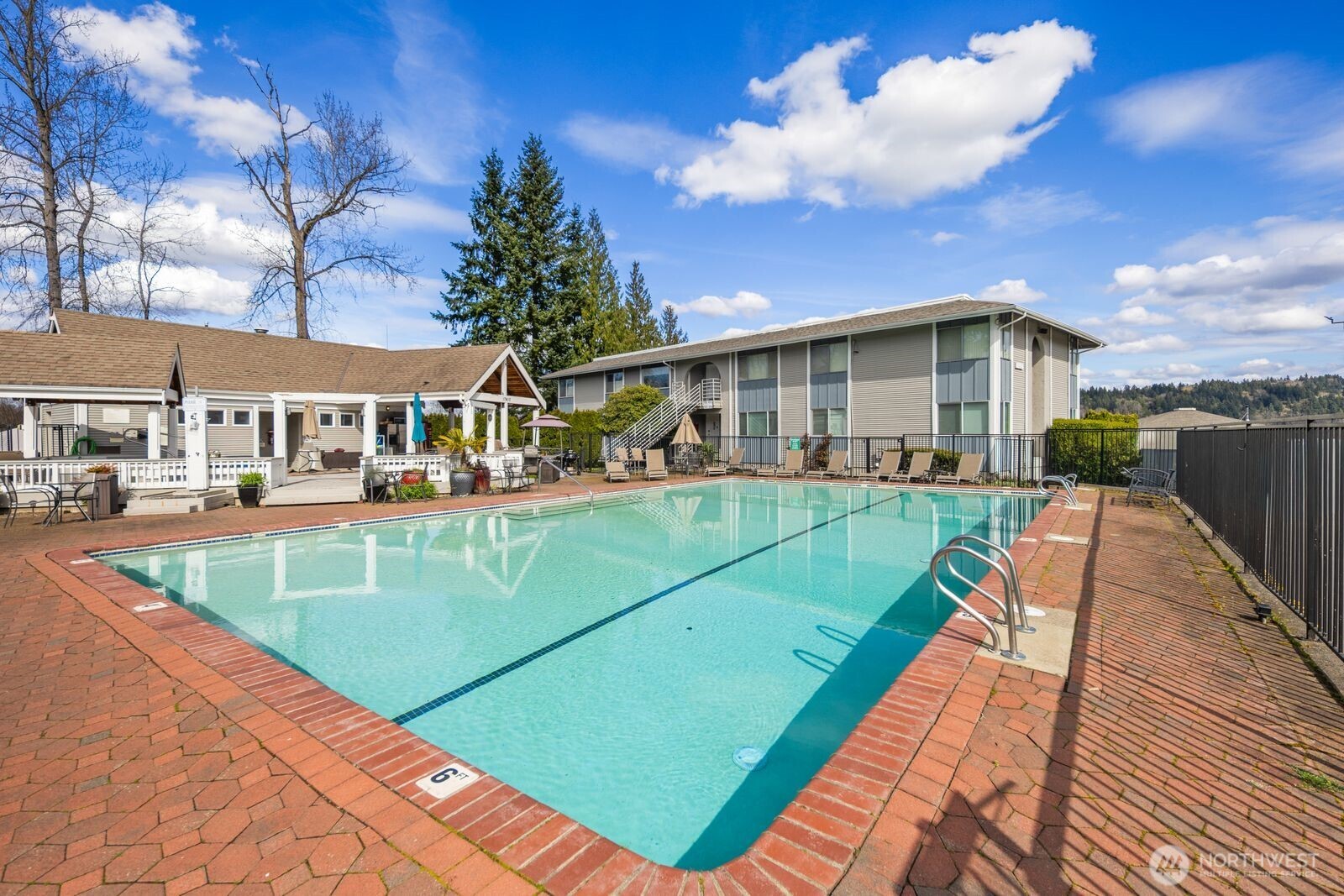 Wonderful amenities include an outdoor pool and hot tub.