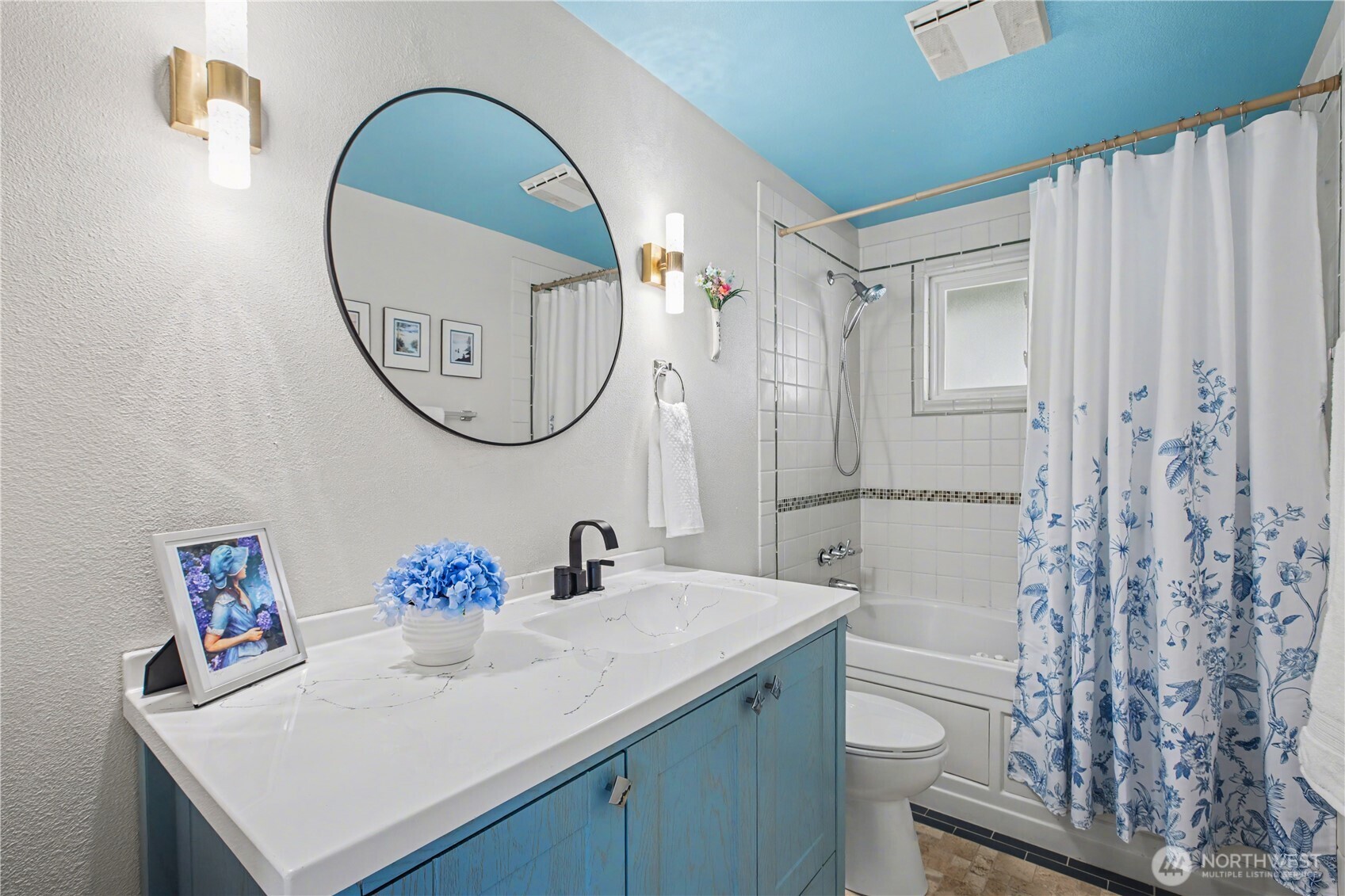 Updated bathroom featuring stylish finishes and a soaking tub, thoughtfully designed for relaxing and everyday convenience.