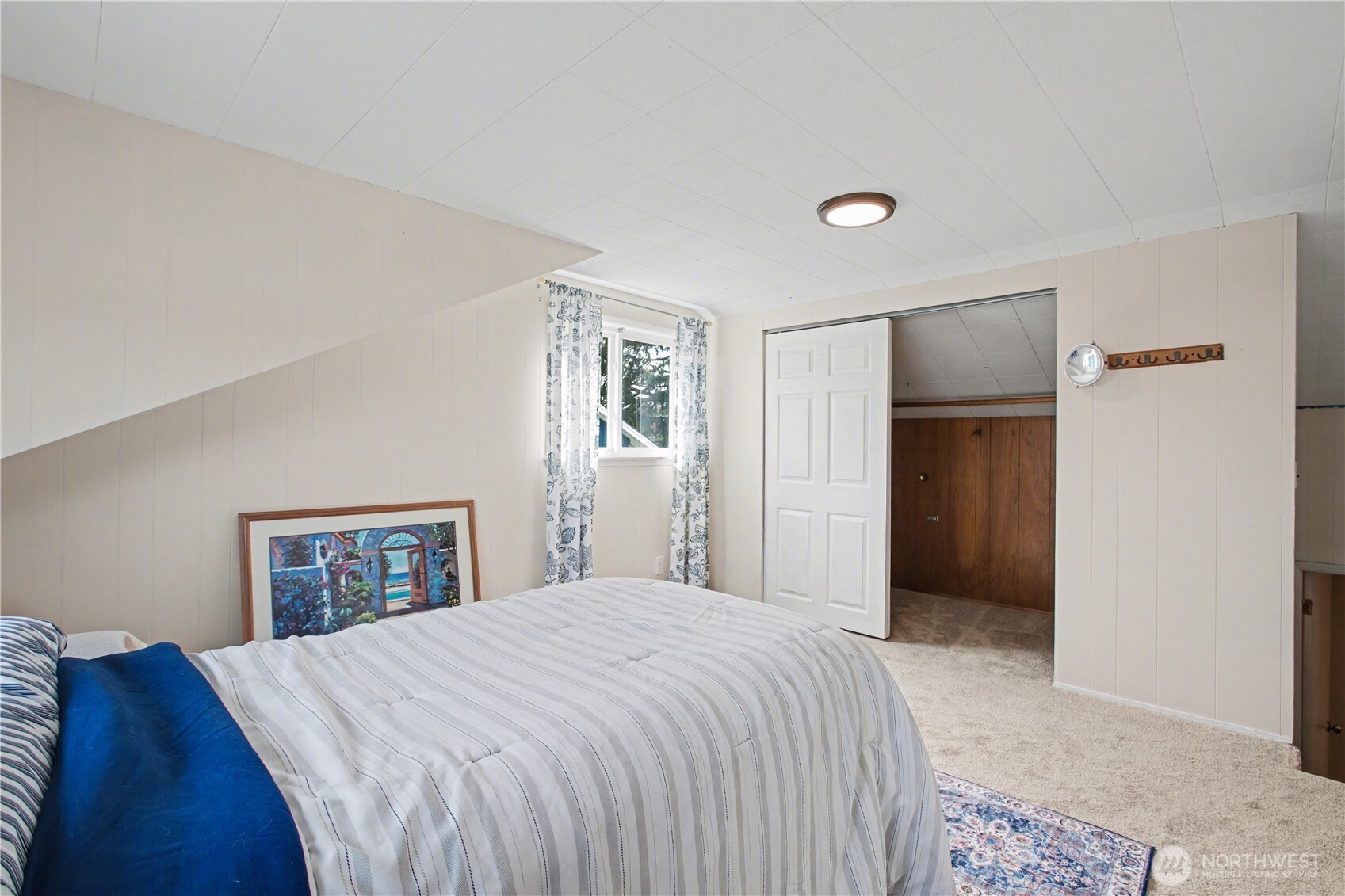 Newly refreshed bonus room with updated finishes, providing a bright and flexible space ready to adapt to your lifestyle needs.