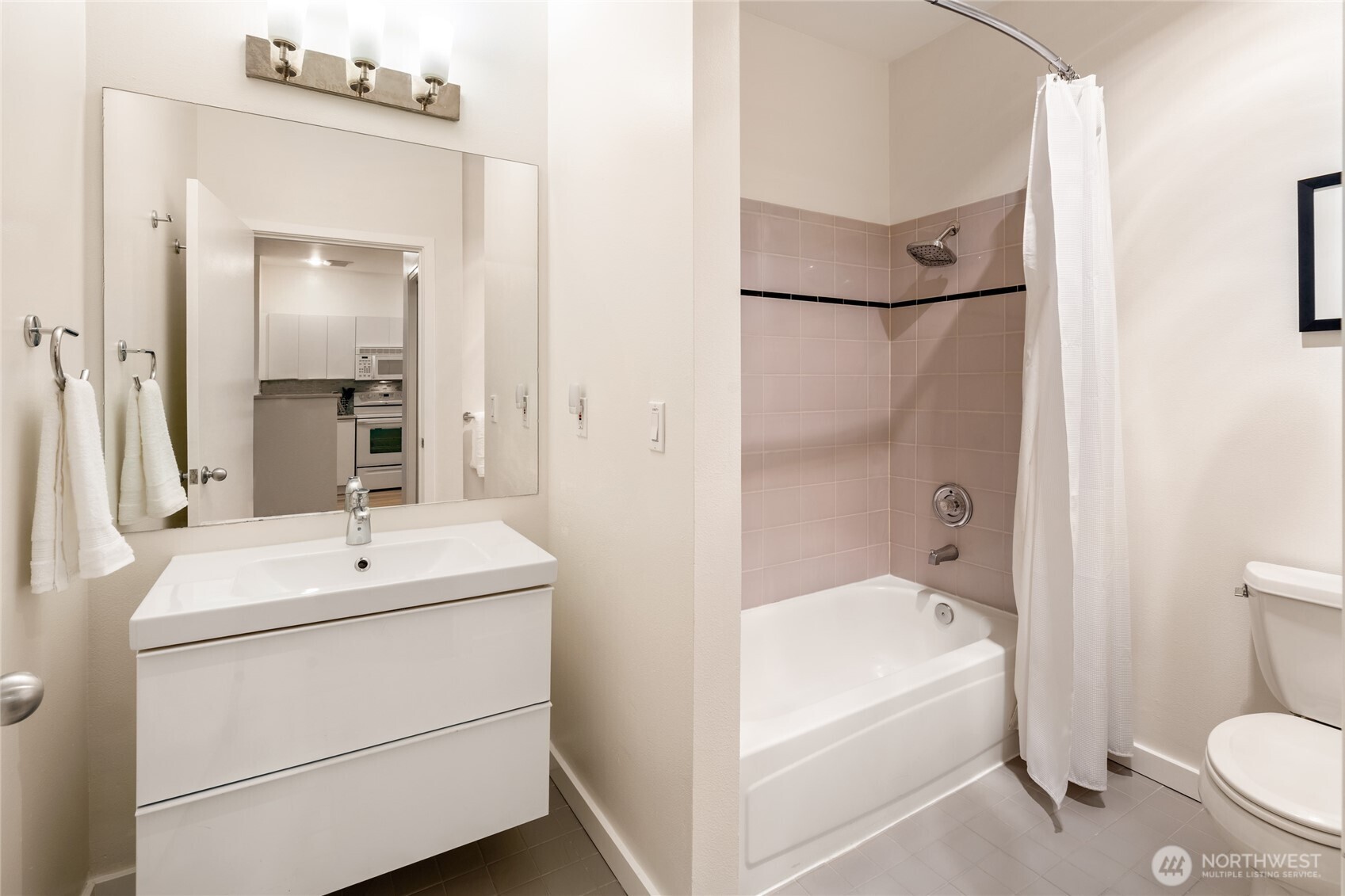 Sleek full bathroom.
