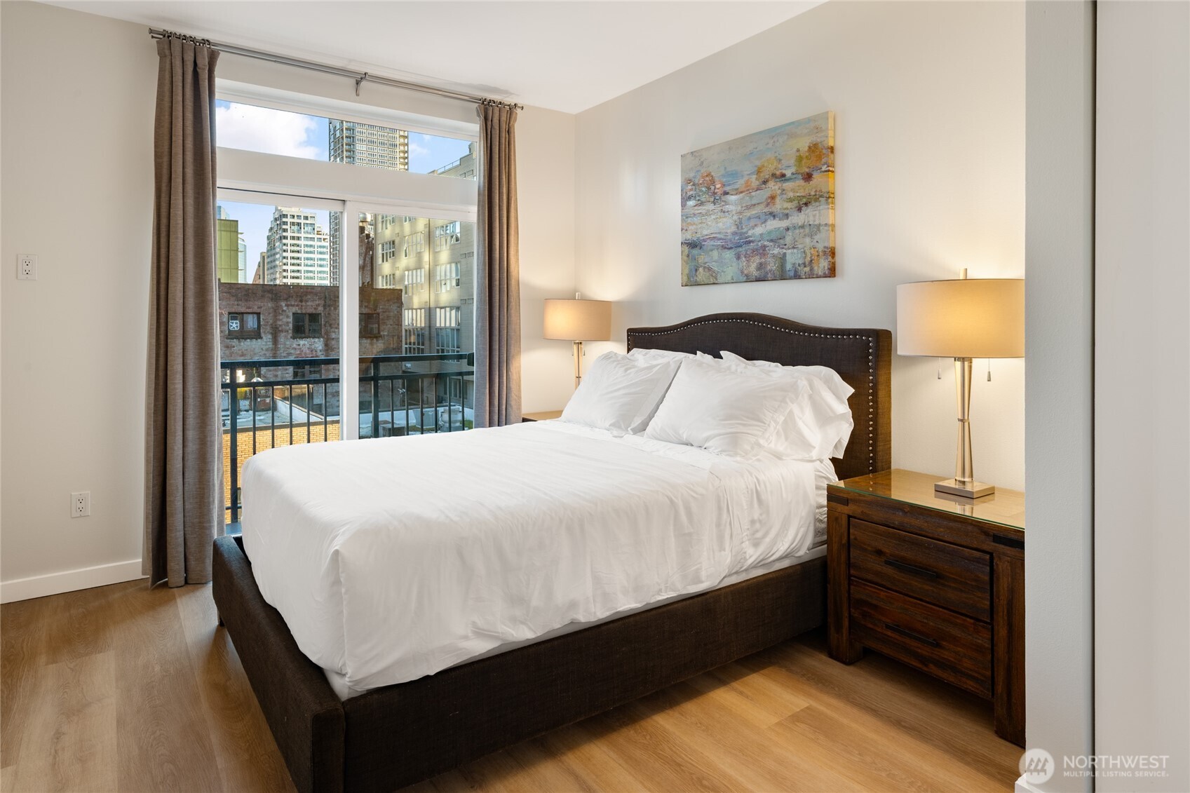 The spacious bedroom is your ideal in-city retreat.