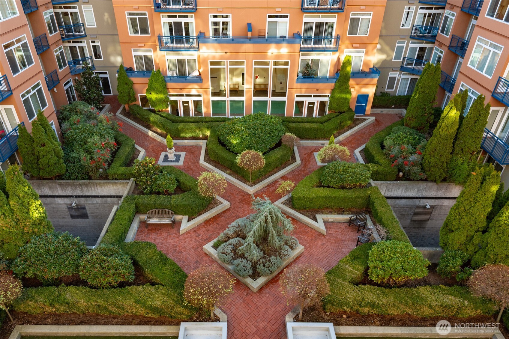 The picturesque courtyard is centered between the two buildings that make up Belltown Court.