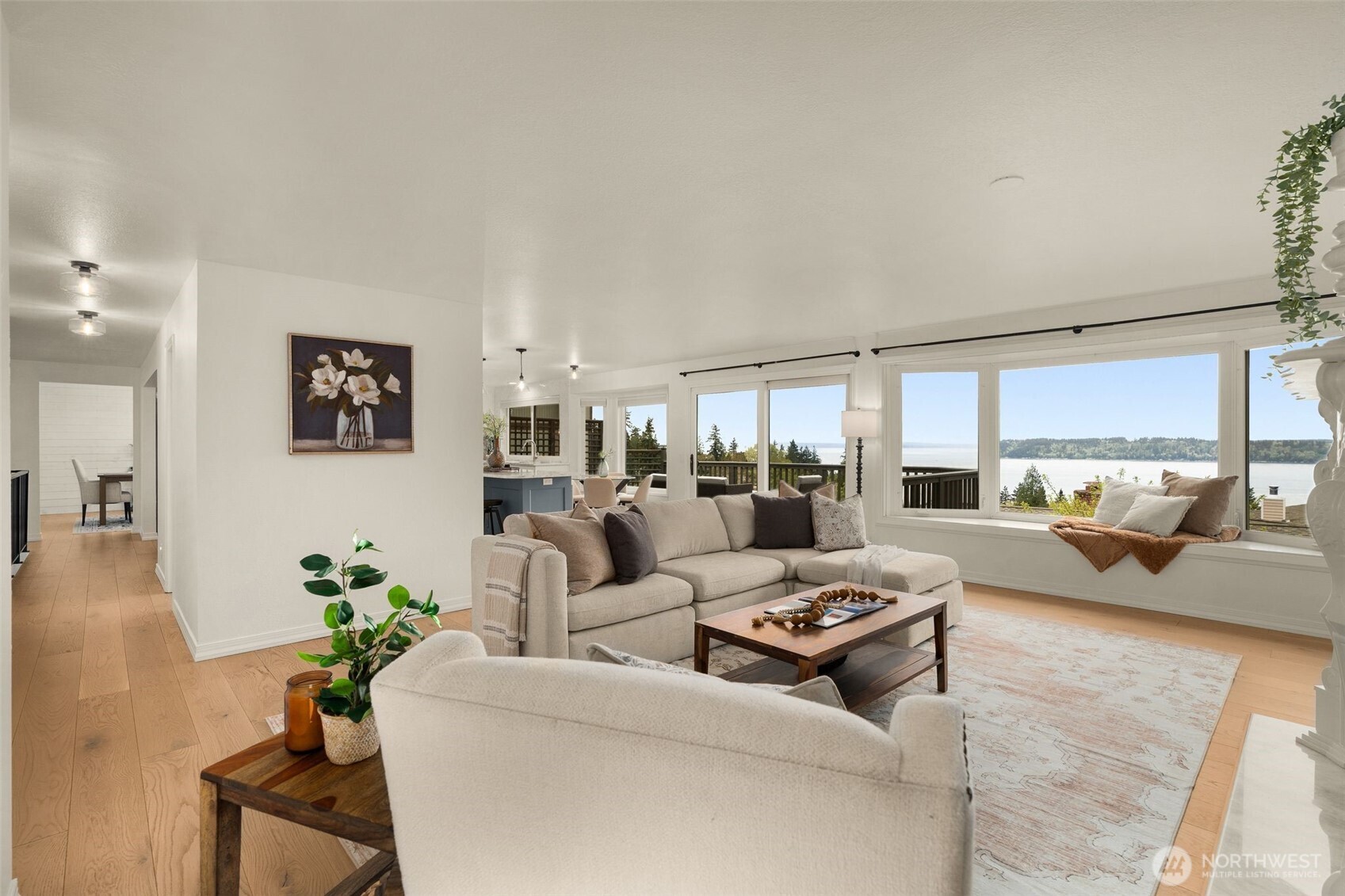 Cross section shot of views and hallway with 1/2 bath for guests.