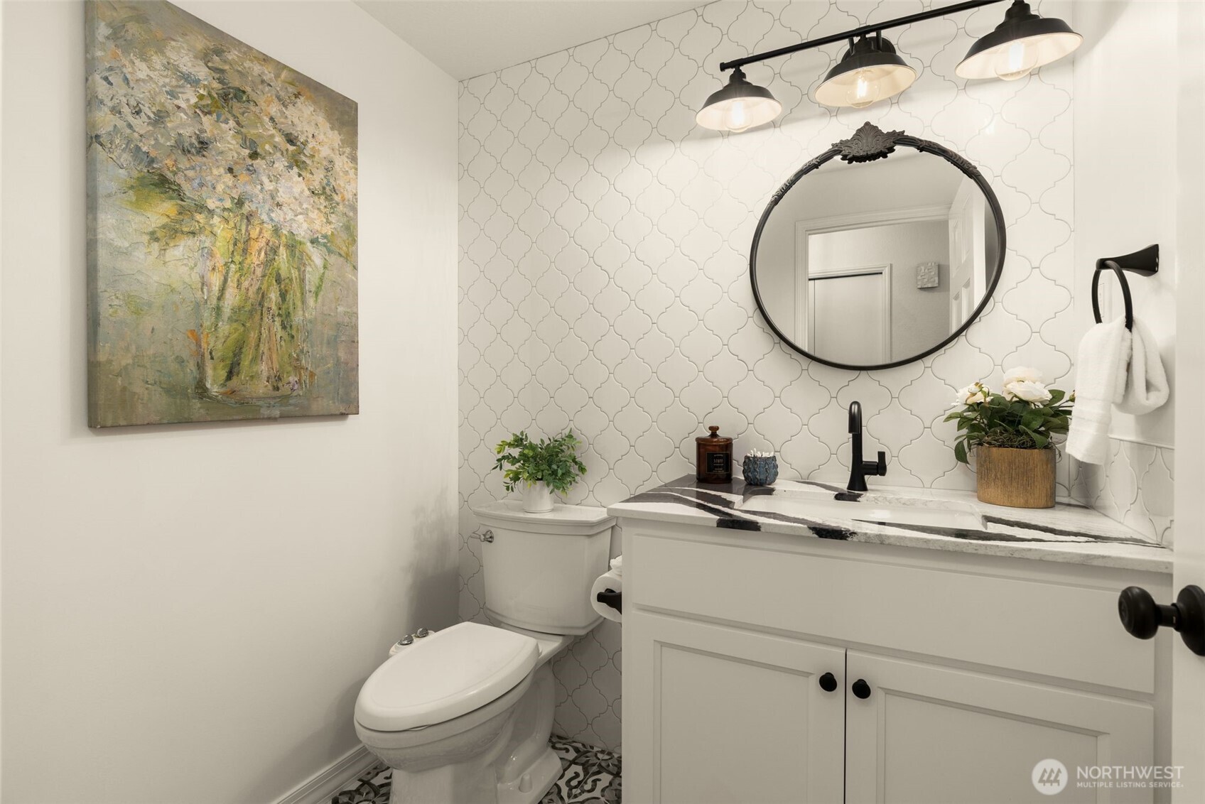 Custom memorable finishes. 1/2 bath for your guests.