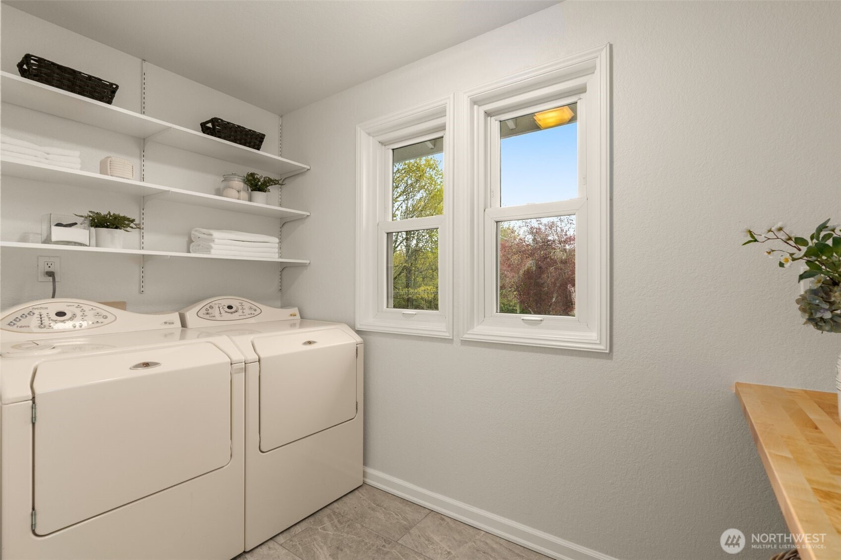 One of two laundry rooms. Upper level. Folding counter.