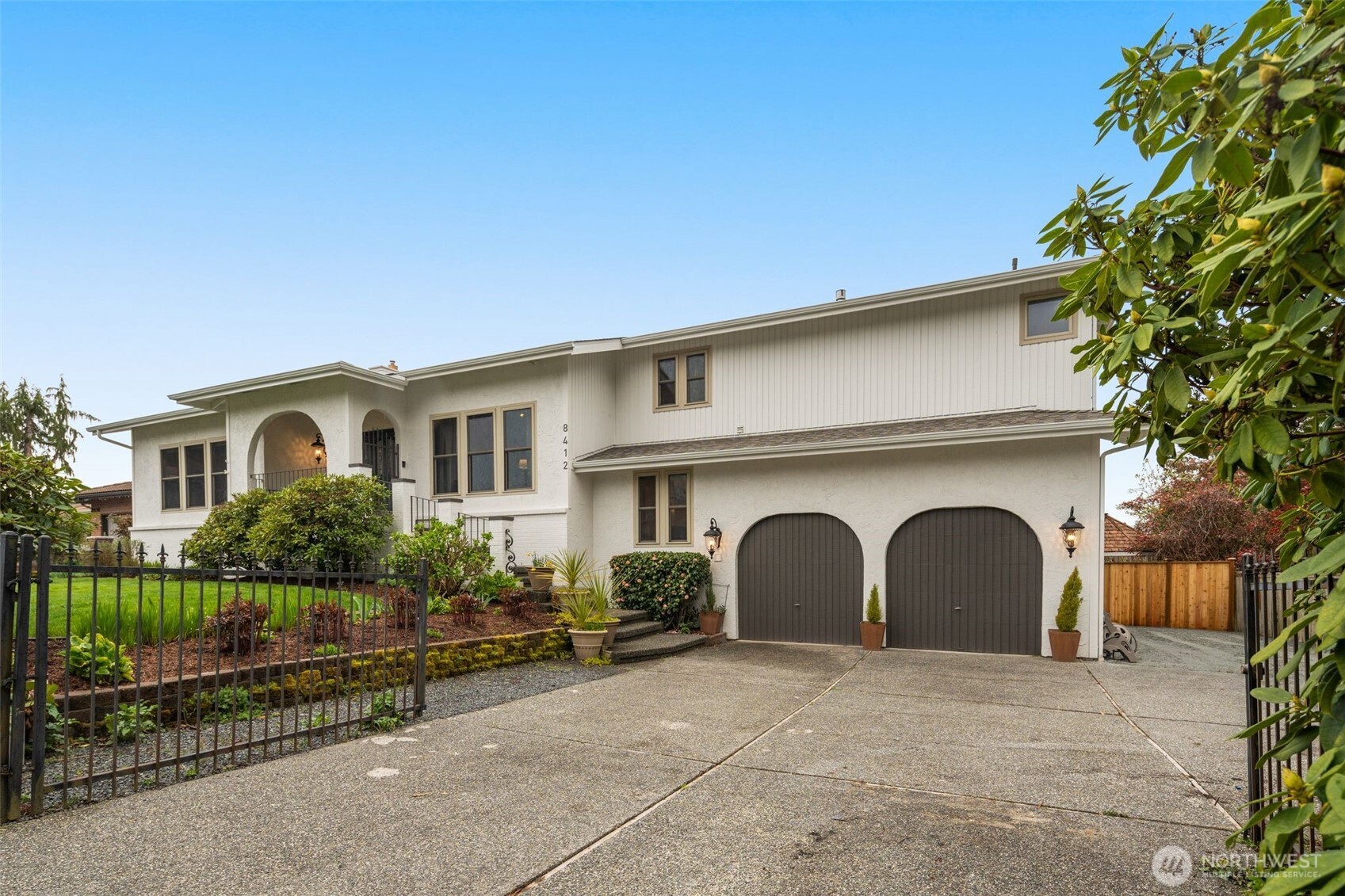 Oversized two car garage, side yard RV parking, driveway and off street parking.