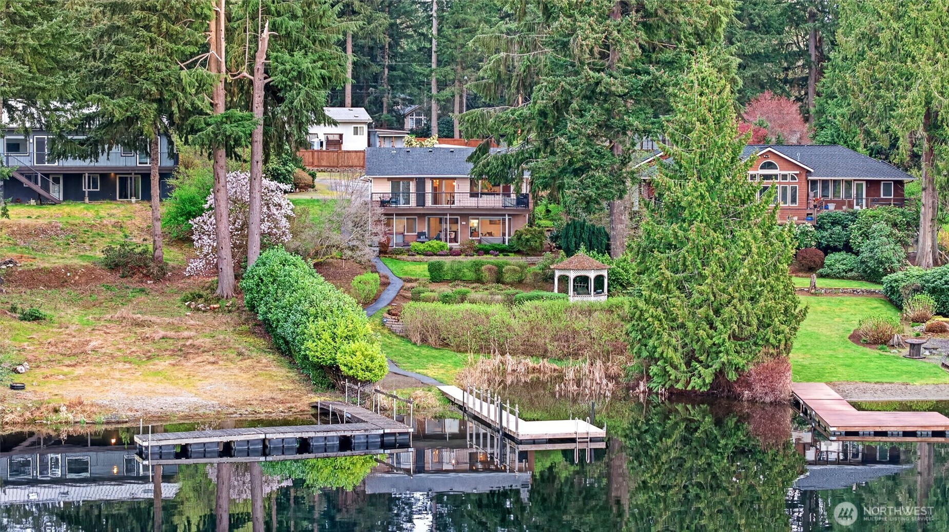 Private waterfront with dock access on Echo Lake, perfect for boating, kayaking, and lakeside living