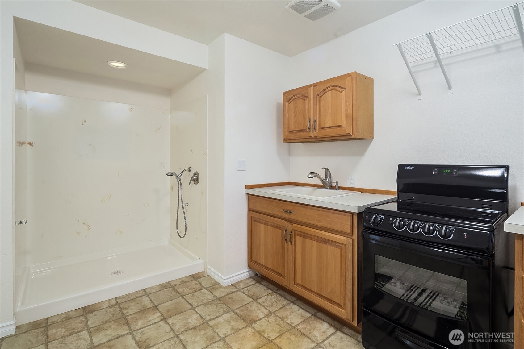 Downstairs mud room with Dog bath