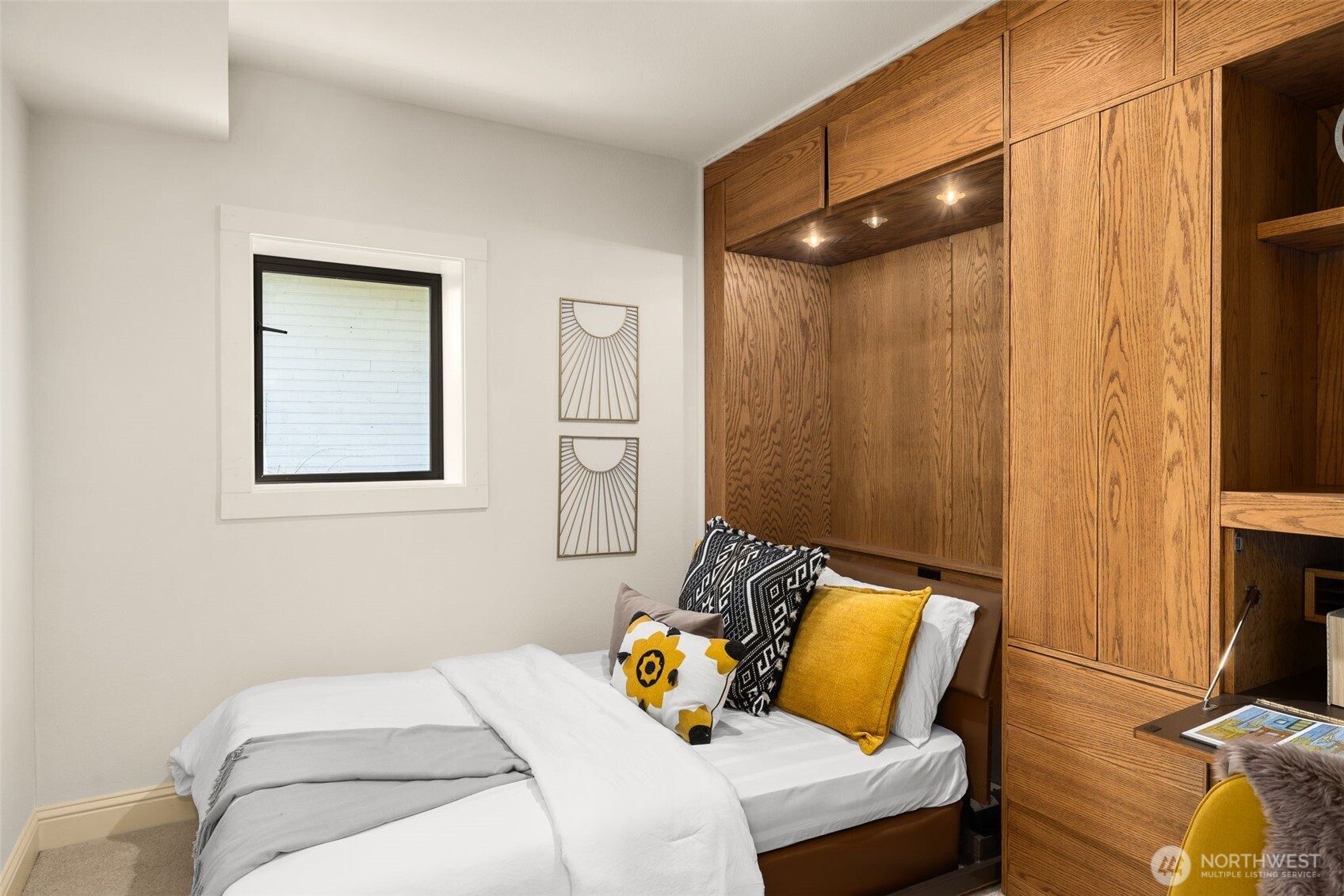 3rd bedroom with murphy bed and built-in desk.