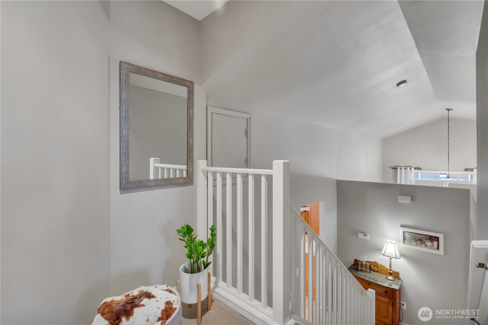 Welcoming landing at the top of the stairs.