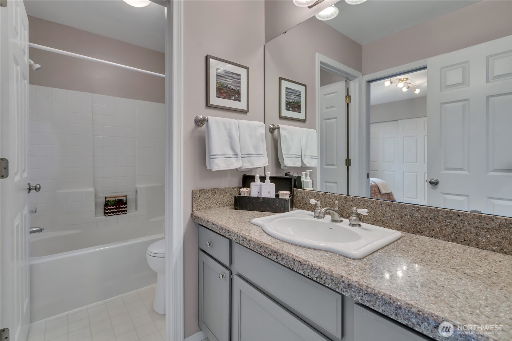 Jack and Jill Bath with separate shower and toilet area.