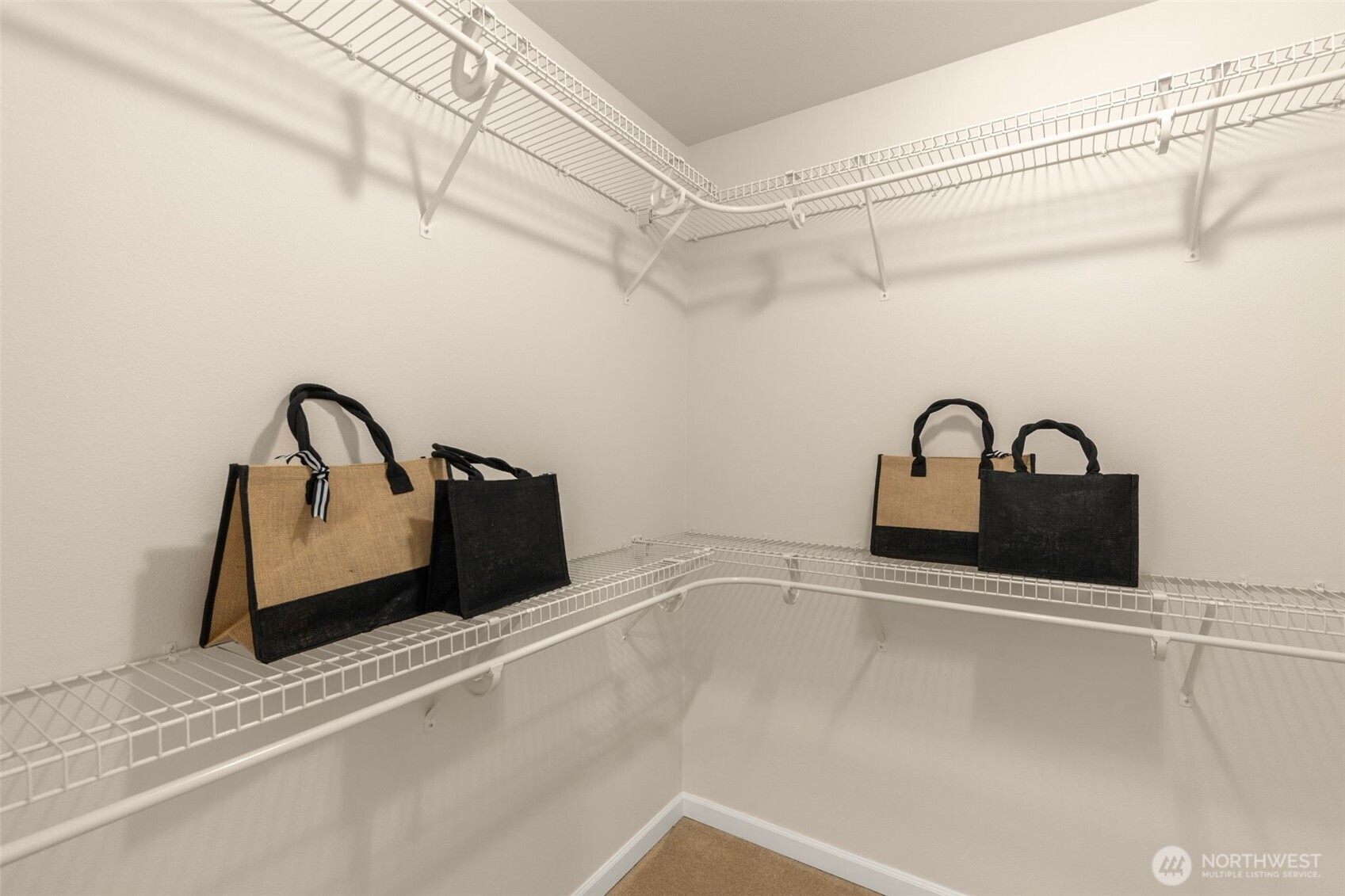 spacious his & her walk-in closets