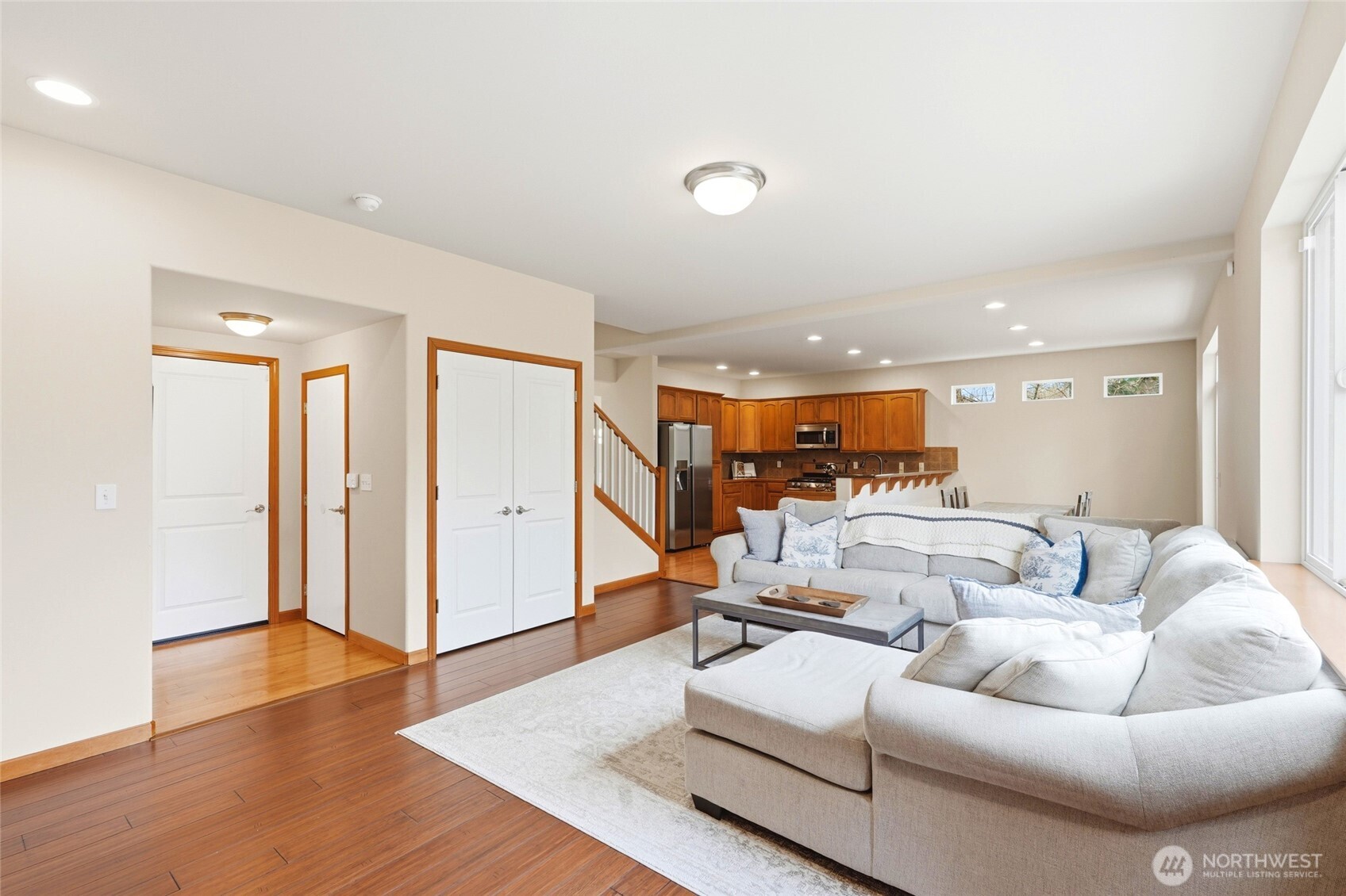 Garage entrance is just off the family room, with a half bath and large coat closet.